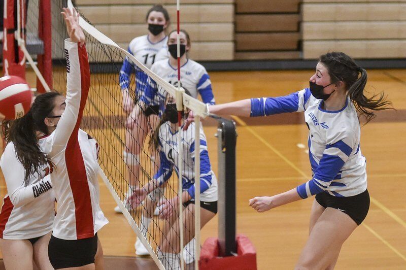 SERVE'S UP: Danvers volleyball welcomes Masconomet to NEC with four set triumph